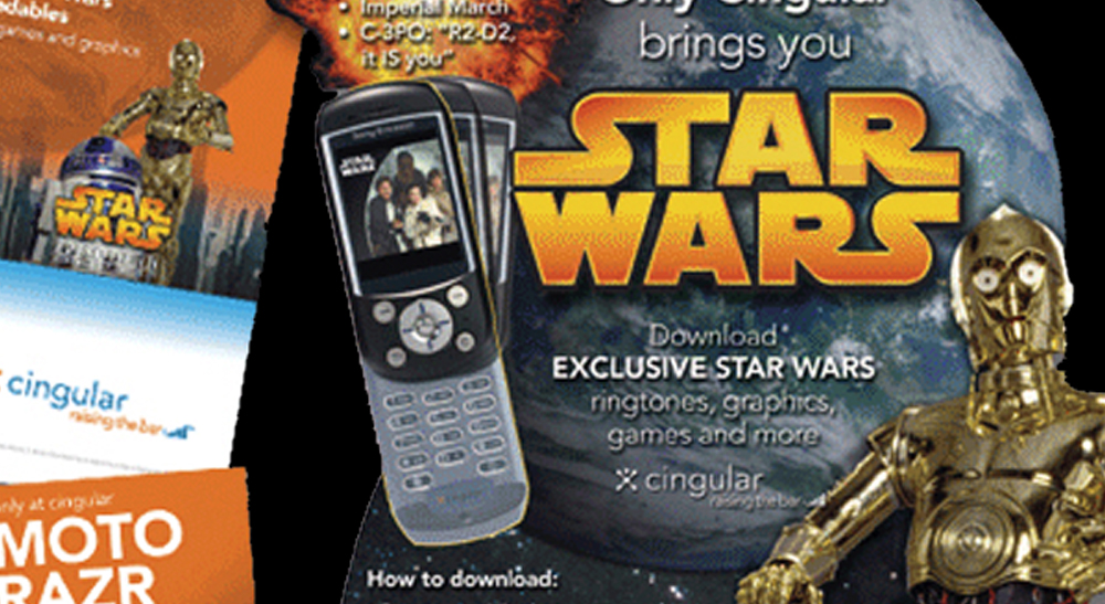 A magazine cover with a cell phone and a star wars logo.