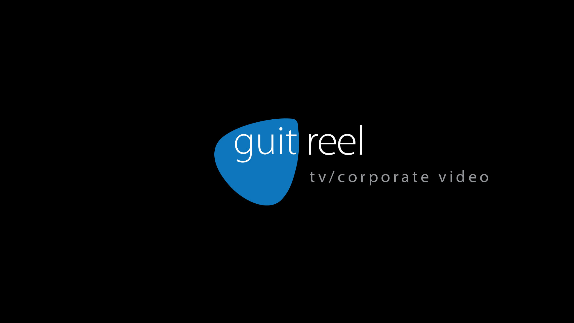 A black background with the words guit reel written in blue.