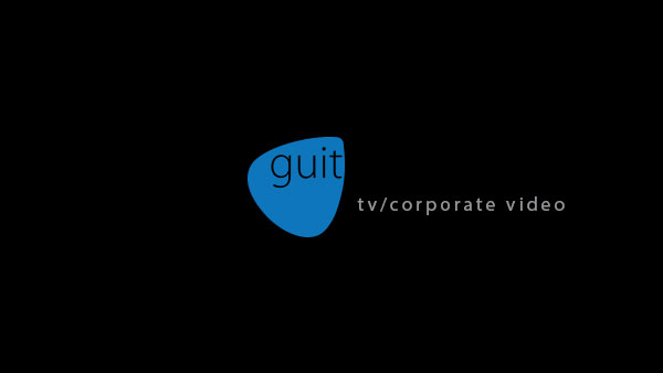 A black background with the word " guit " written in blue.